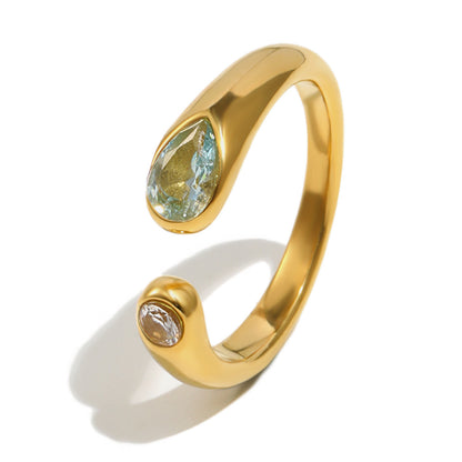 Open serpent ring with pear and round zircon stones