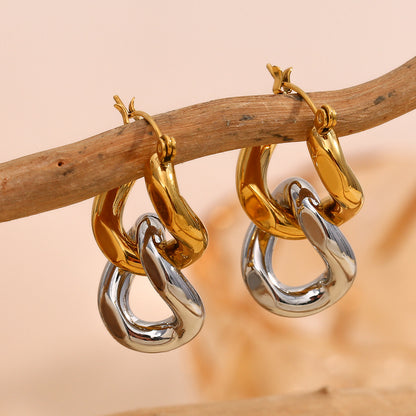 Close-up of two-tone chain link earrings