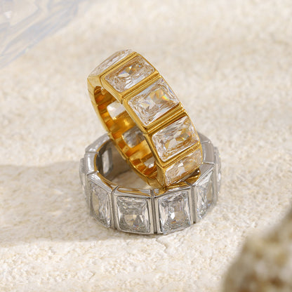 Minimalist geometric hollow-cut stainless steel ring with square cubic zirconia stones in silver finish, modern stackable jewelry for women