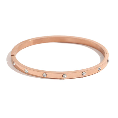 Rose Dot Crystal Bangle in rose gold finish by STUD
