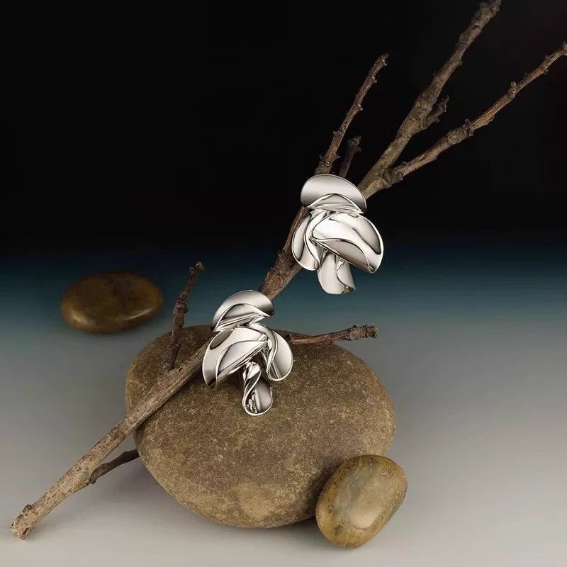 Bold curved leaf stud earrings for occasion looks