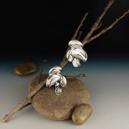 Bold curved leaf stud earrings for occasion looks