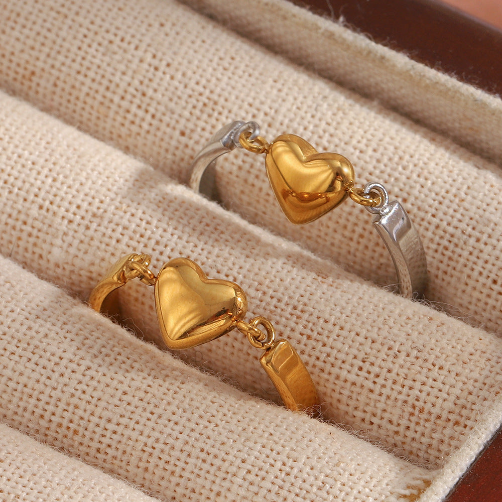 Gold heart ring with minimalist design and 18K gold-plated band