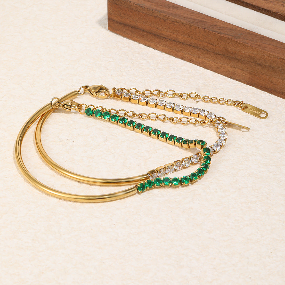 18K gold-plated half bangle half chain bracelet with rich green cubic zirconia stones, vintage-modern statement jewelry for women