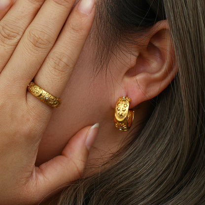 Model Wearing Celestial gold earrings – star, moon & sun motifs, 18K gold-plated, waterproof by STUD (Shop Till You Drop)