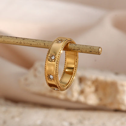 Gold star ring with zircon detailing