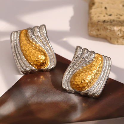 Top View of Two-tone gold bean stud earrings – minimalist 18K gold-plated, waterproof jewelry by STUD (Shop Till You Drop)