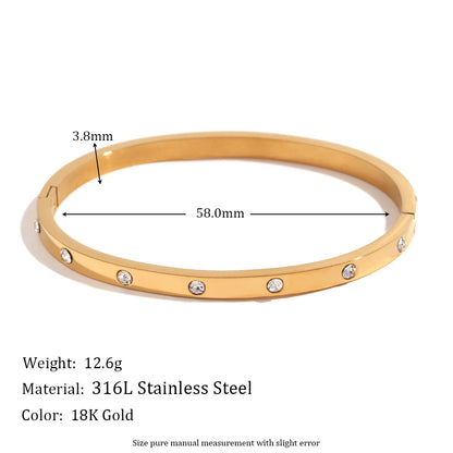 Silver stainless steel zircon bangle with round stones and snap-lock clasp – STUD