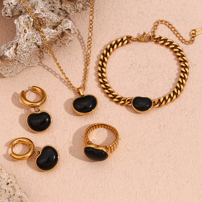Side view of black heart ring