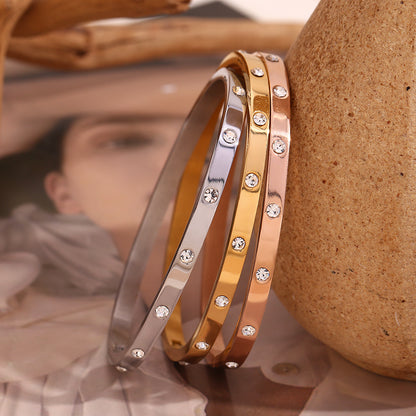 Minimal rose gold crystal bangle for wrist stacking