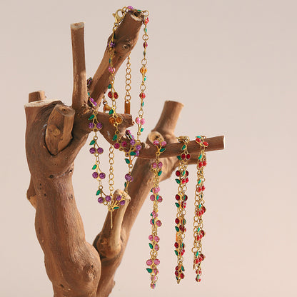 Colorful cherry enamel bracelet with 18K gold finish and leaf details