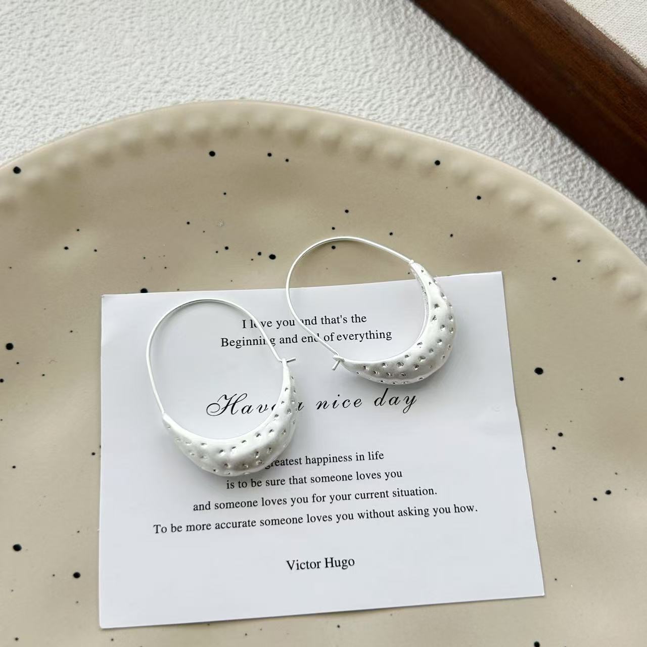 Minimalist Crescent Hoop Earrings in gold finish by STUD