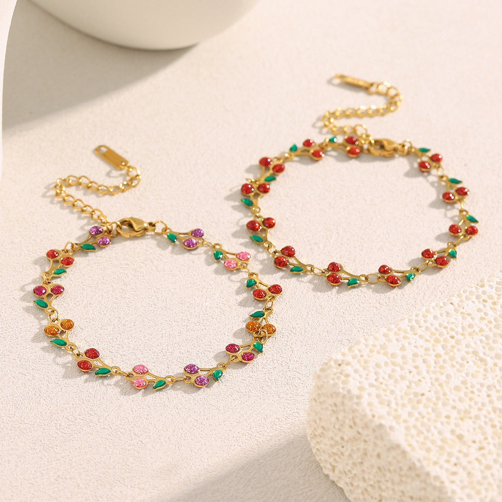 Colorful cherry enamel bracelet with 18K gold finish and leaf details