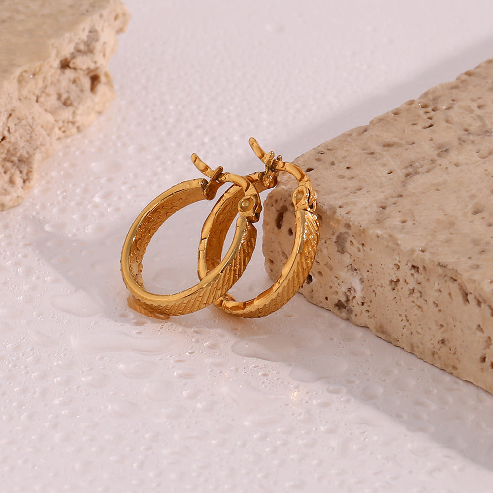 STUD 18K gold-plated slanted textured hoop earrings