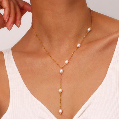 Model wearing Minimalist Pearl Y-Chain Necklace