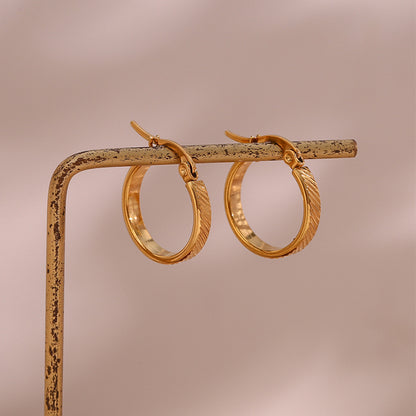 STUD 18K gold-plated slanted textured hoop earrings