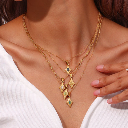 Close-up of cat eye-style stone necklace