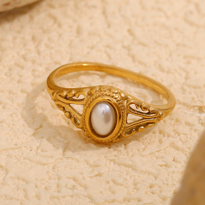 Delicate, feminine, and timeless — this Gold Plated Pearl Flower Ring is designed to elevate any look with understated charm. Featuring a dainty floral motif paired with fine pearls, it captures the essence of modern minimalism and vintage elegance. Made from stainless steel and finished in radiant gold plating, it's waterproof and anti-tarnish — perfect for daily wear without compromising shine or style.
