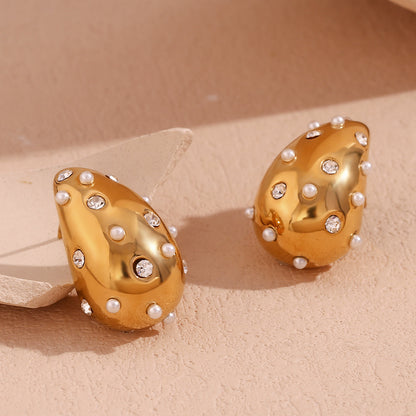Close View of Gold hollow teardrop earrings with pearls – 18K gold-plated, waterproof, hypoallergenic by STUD (Shop Till You Drop)