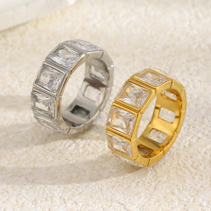 Minimalist geometric hollow-cut stainless steel ring with square cubic zirconia stones in silver finish, modern stackable jewelry for women