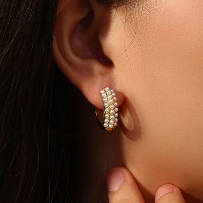 Model Wearing Baroque pearl hoop earrings – minimalist 18K gold-plated, waterproof, hypoallergenic by STUD (Shop Till You Drop)

