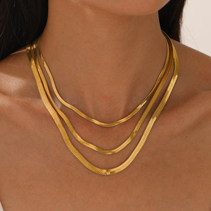 Model Wearing Flat snake chain necklace in 18K gold-plated stainless steel – sleek, minimalist design by STUD-Shop Till You Drop