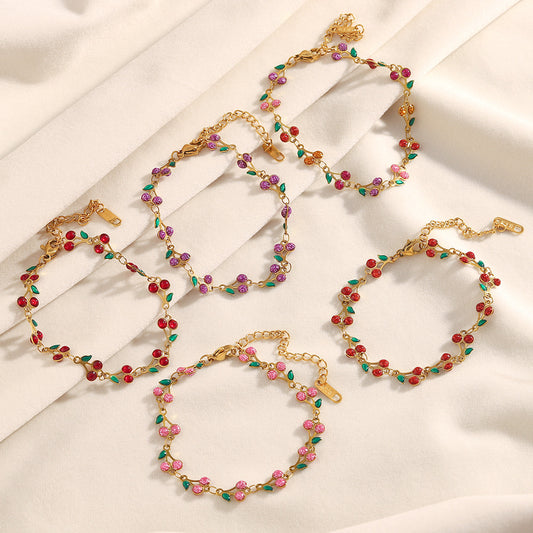 Colorful cherry enamel bracelet with 18K gold finish and leaf details