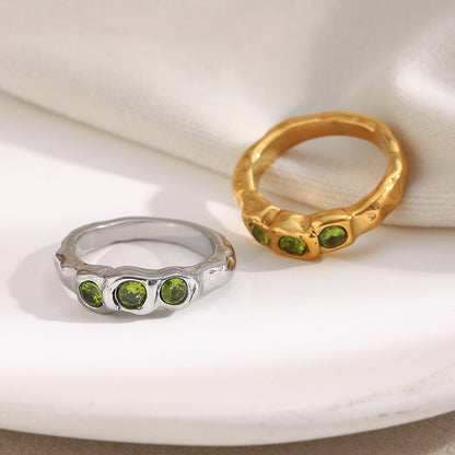 18K gold-plated chunky sculptural ring with three olive-green round cubic zirconia stones in raised square bezel settings, modern statement ring for women