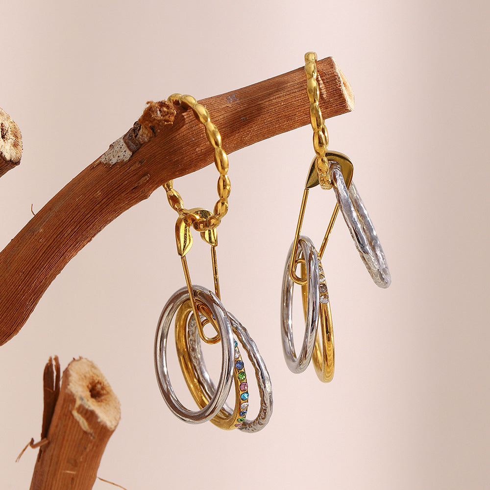 Bold sparkle safety pin ring with colorful stones and multi-layer design in 18K gold