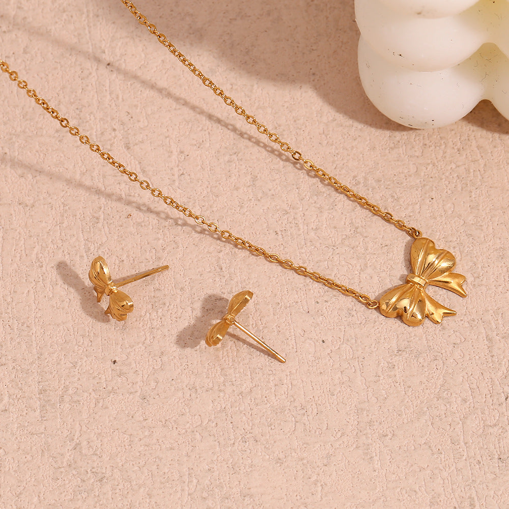 Gold bow pendant necklace - 18K gold plated, waterproof and hypoallergenic by STUD