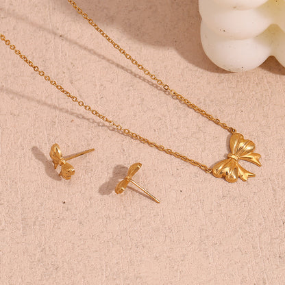 Gold bow pendant necklace - 18K gold plated, waterproof and hypoallergenic by STUD