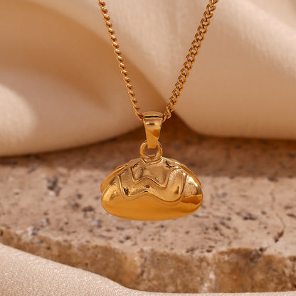Close view of pearl clam pendant necklace