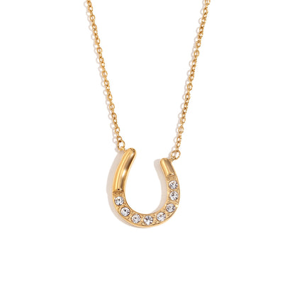 Golden horseshoe pendant necklace with zircon crystals – 18K gold plated by STUD-Shop Till You Drop