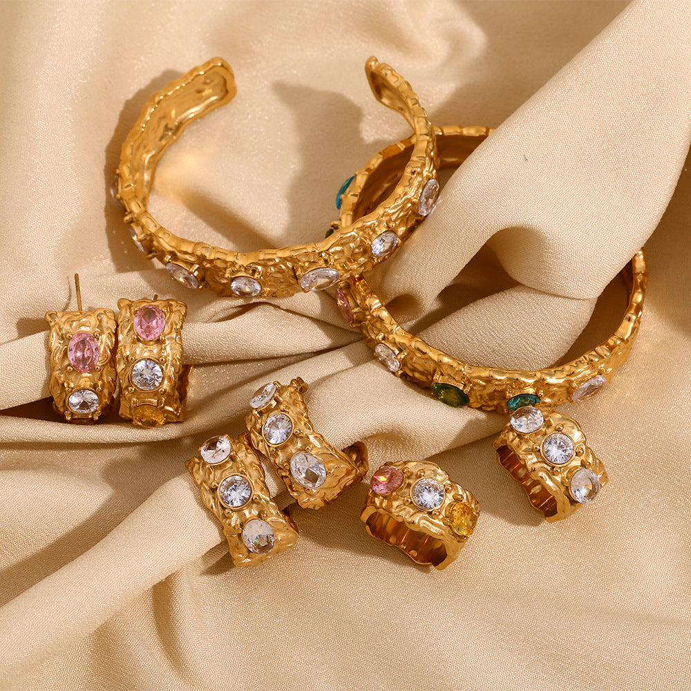 STUD 18K gold-plated sculpted earrings with clear zircon stones