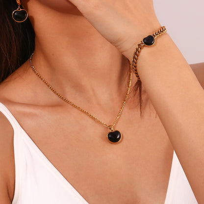 Black onyx-inspired heart pendant necklace in gold finish