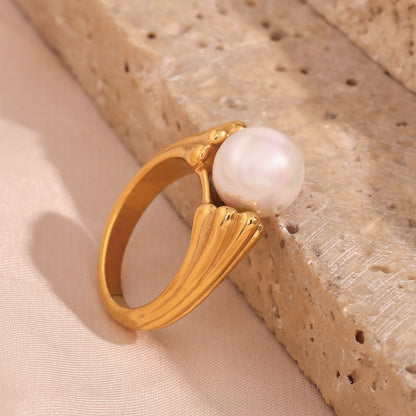 close up view of Textured pearl ring with dual-sided band – 18K gold-plated stainless steel with faux pearl center – elegant jewelry by STUD (Shop Till You Drop)