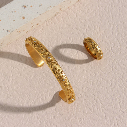 Side view of gold celestial bangle for women