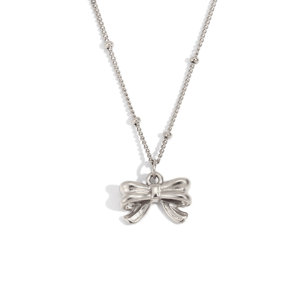 Silver bow pendant necklace - Hypoallergenic and anti-tarnish silver jewelry by STUD