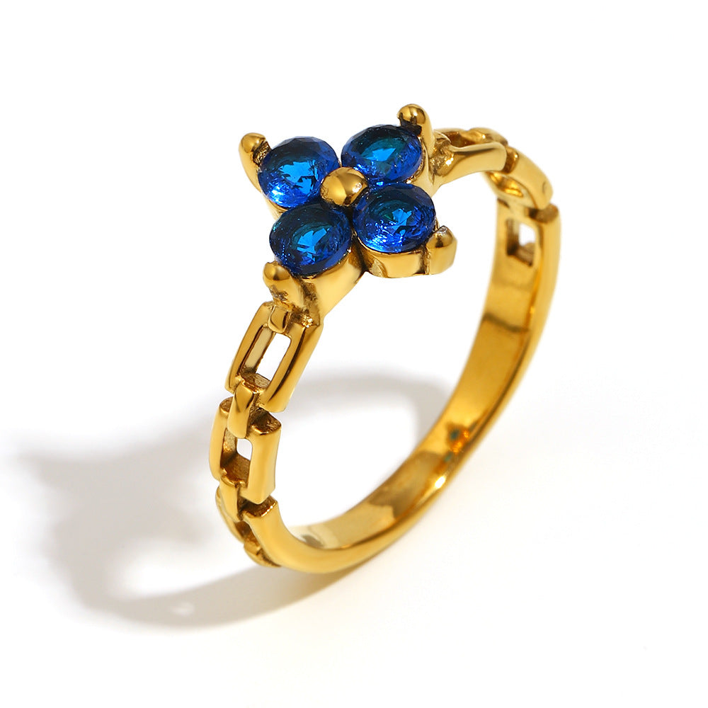 Gold-plated chain band ring with blue zircon flower center – STUD