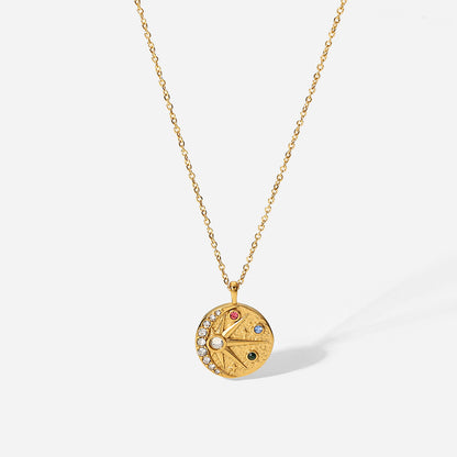 Detail view of compass pendant necklace