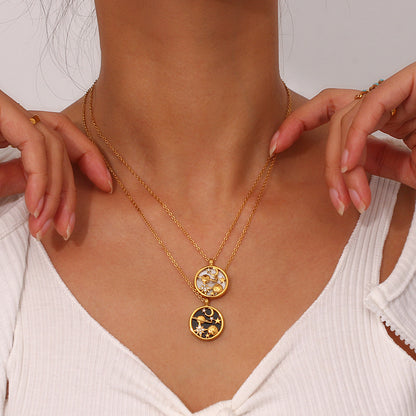 Gold celestial charm necklace