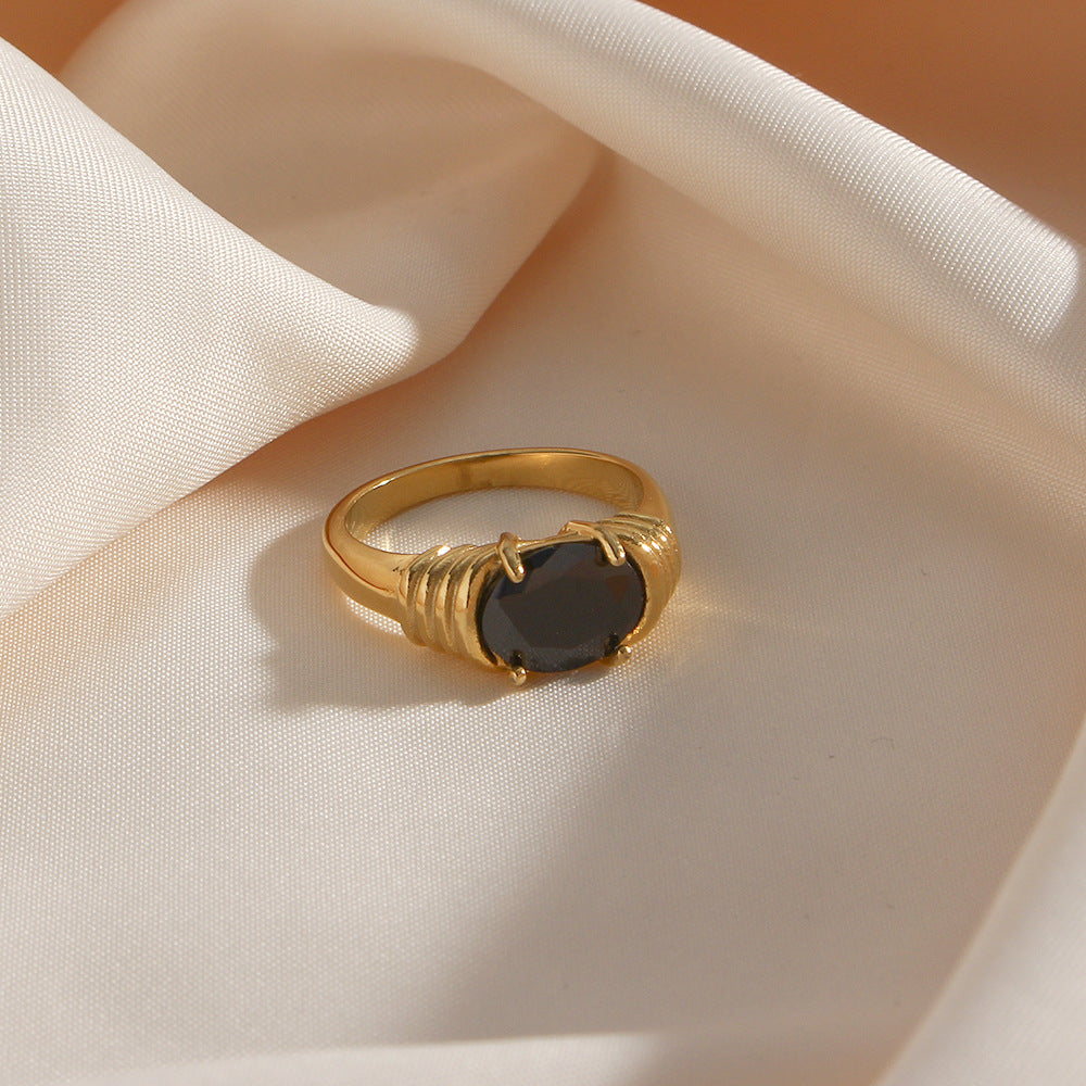 Gold plated stainless steel oval ring with black zircon center stone – STUD