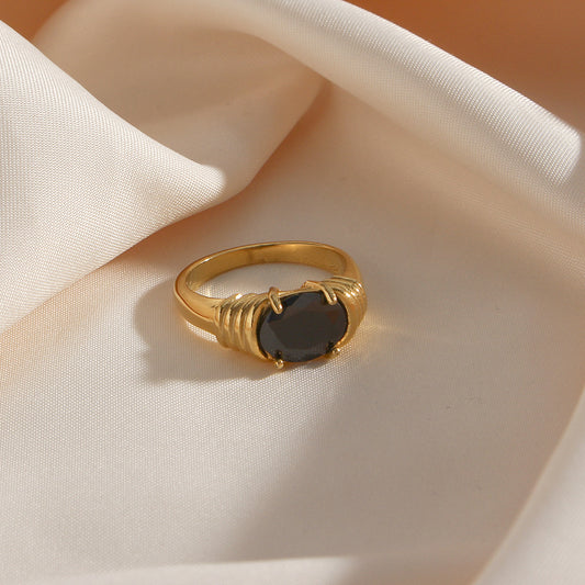 Gold plated stainless steel oval ring with black zircon center stone – STUD