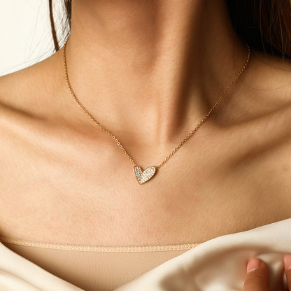Model Wearing Heart of gold necklace with zirconia inlay – gold plated stainless steel by STUD-Shop Till You Drop