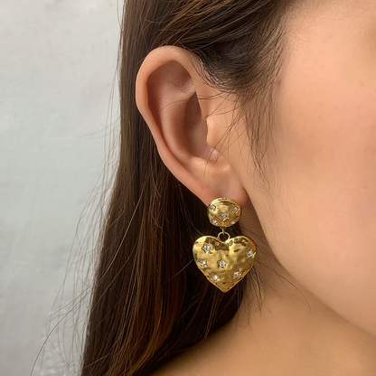 Model Wearing Golden Glam 14K gold-plated heart and star earrings with zirconia – waterproof, hypoallergenic by STUD (Shop Till You Drop)