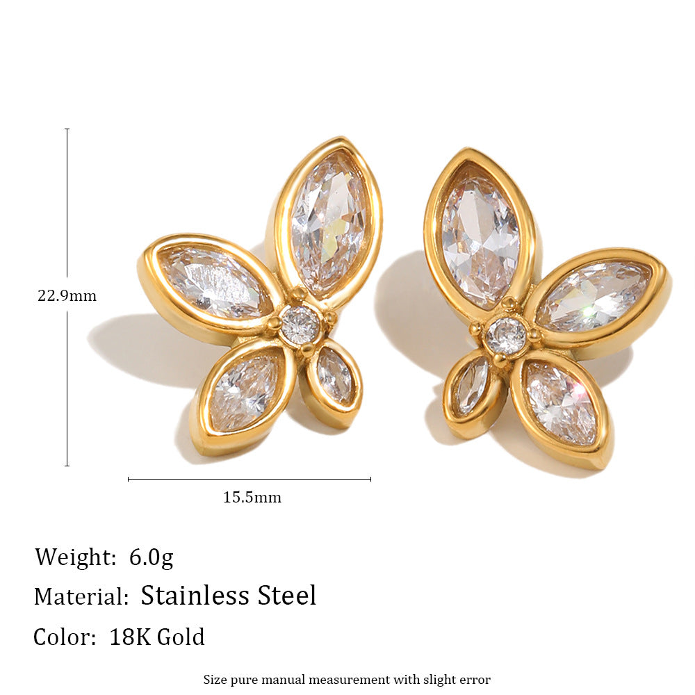 Gold marquise-shaped earrings with clear stones, shown with measurements and material details.